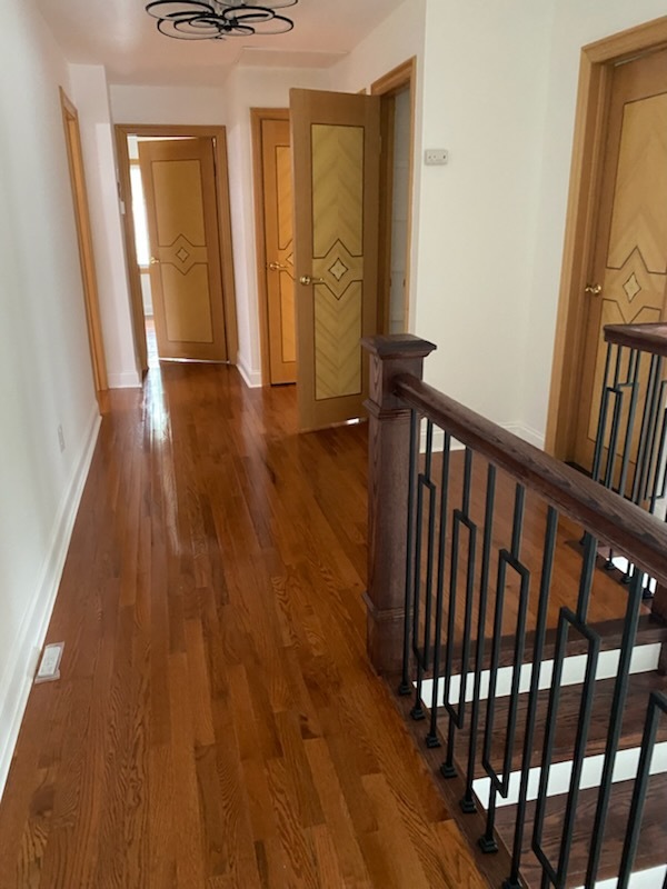 Polished hardwood hallway after deep clean in Hillside NJ